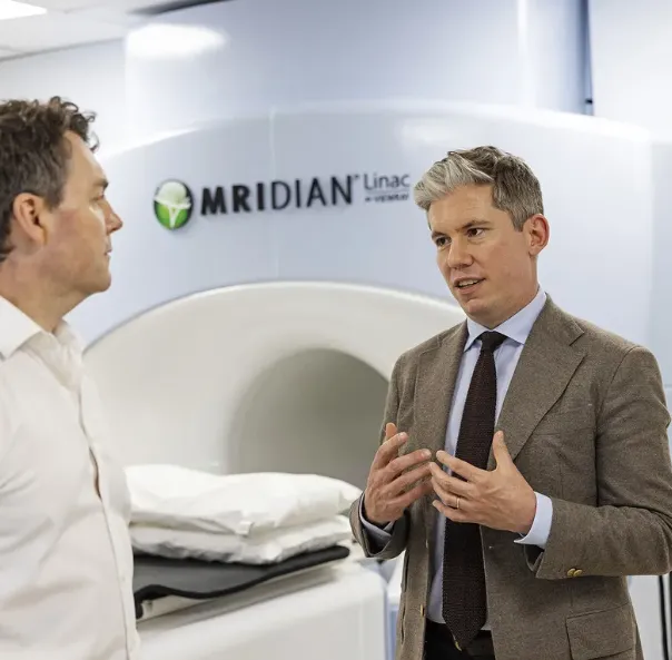 Dr James Wilson discussing skin cancer treatment options with a patient