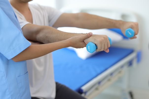 A lung cancer patient working through a supervised exercise programme with a clinical exercise physiologist in London